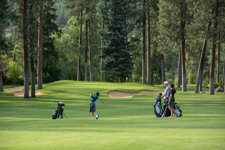 Golfers on the course at Kalispel Golf and Country Club