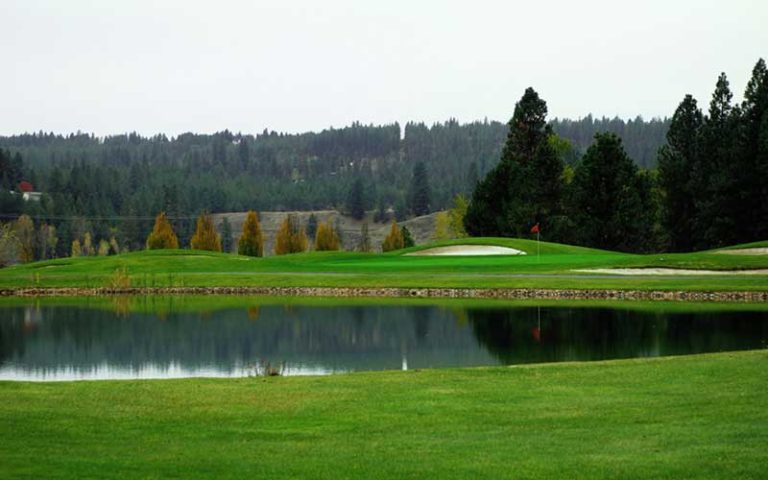Qualchan green beside water